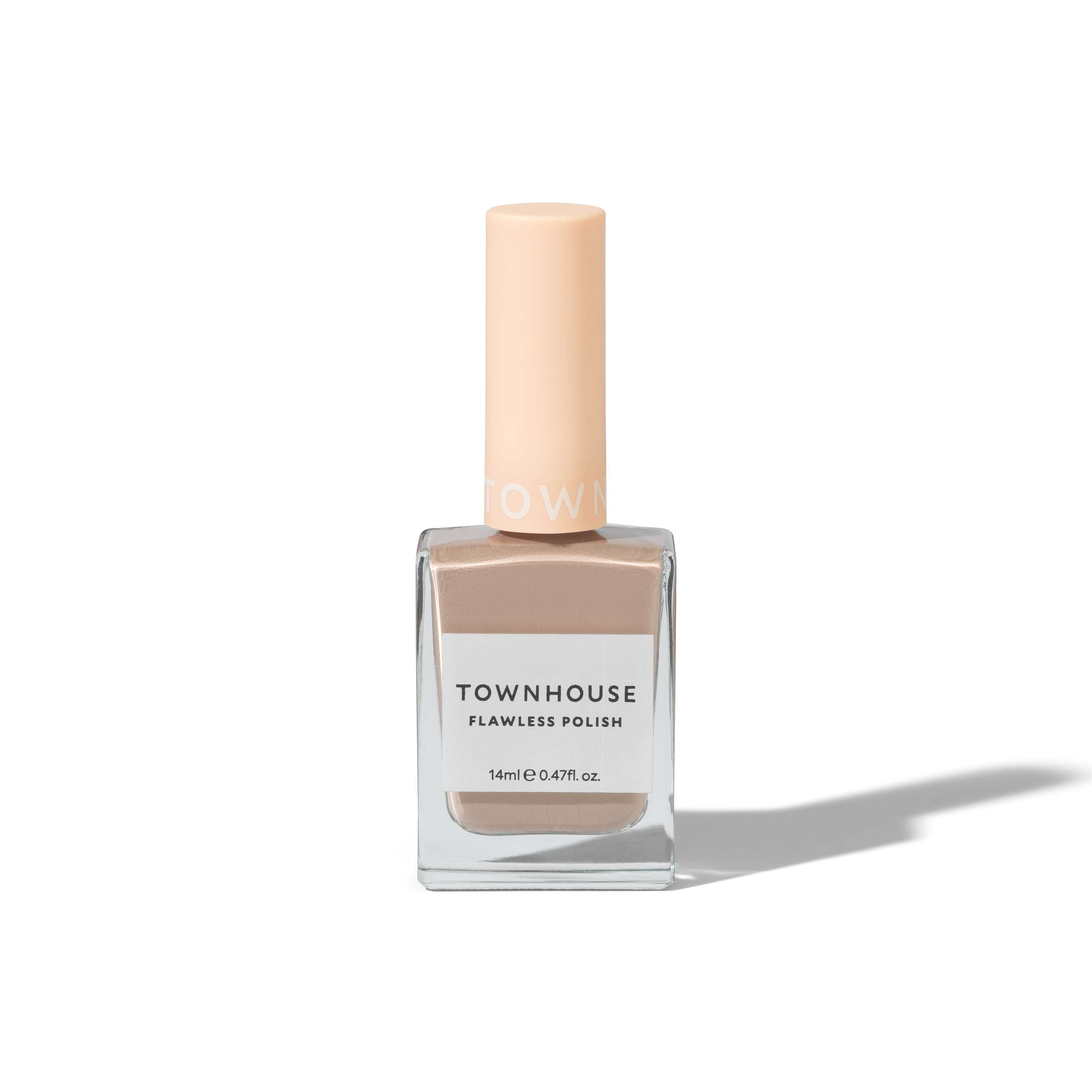 A bottle of TH - Chocolate Milk Polish 14ml, featuring a square glass base filled with cocoa nail polish in a sophisticated nude-brown hue and a matching matte cap, casting a shadow on a white background.