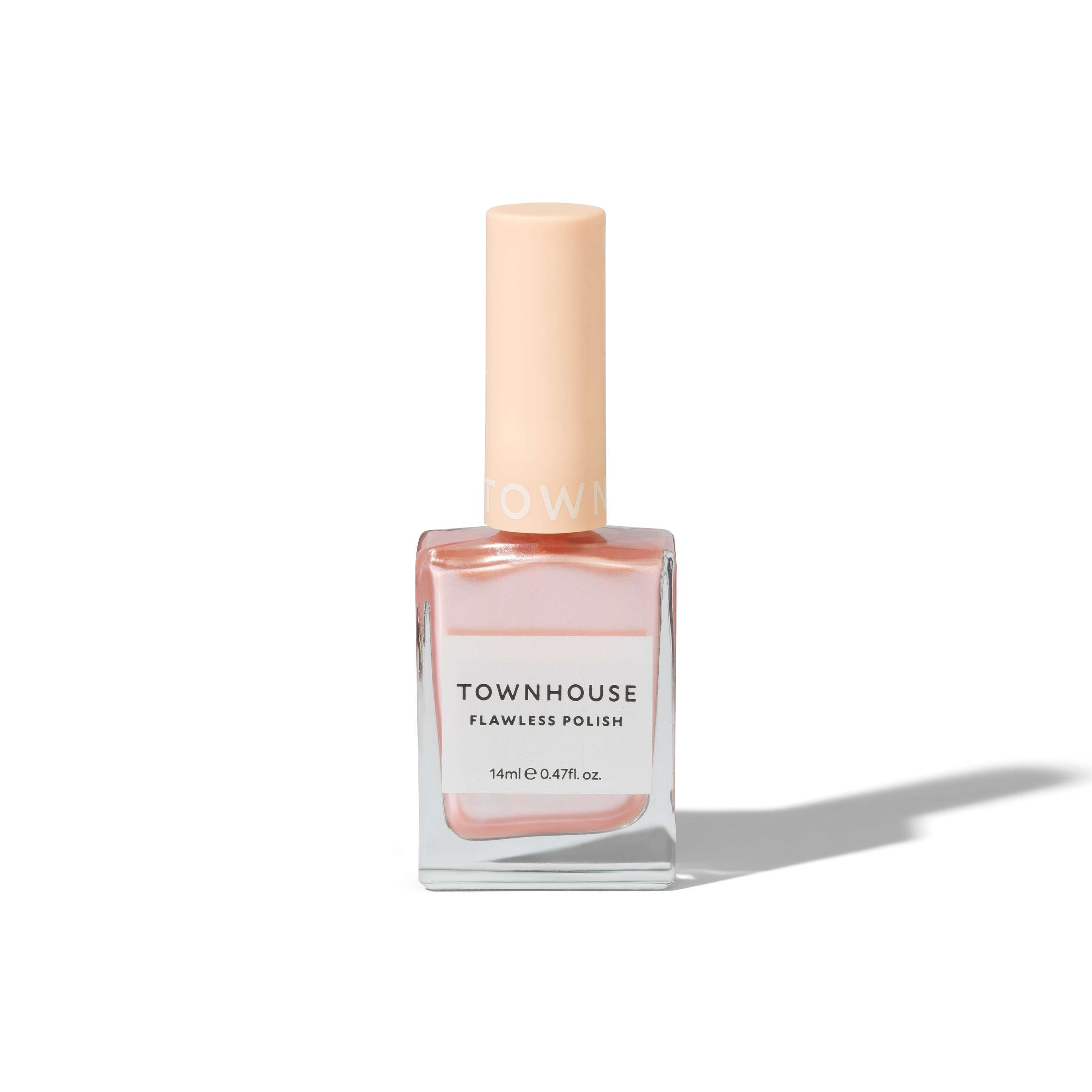 A bottle of TH - Pink Frosting Polish 14ml, featuring a light peach cap and light pink polish inside, ideal for use as a base or top coat, casting a shadow on a white background.