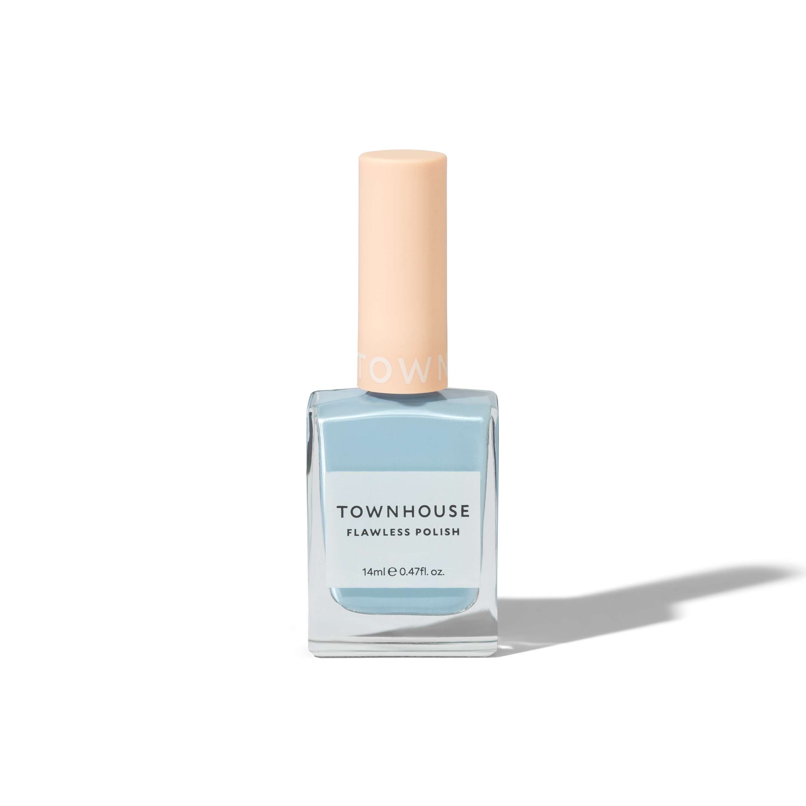 A bottle of TH - Blueberry Milk Polish 14ml in a light blue shade with a beige cap, standing upright on a white background.