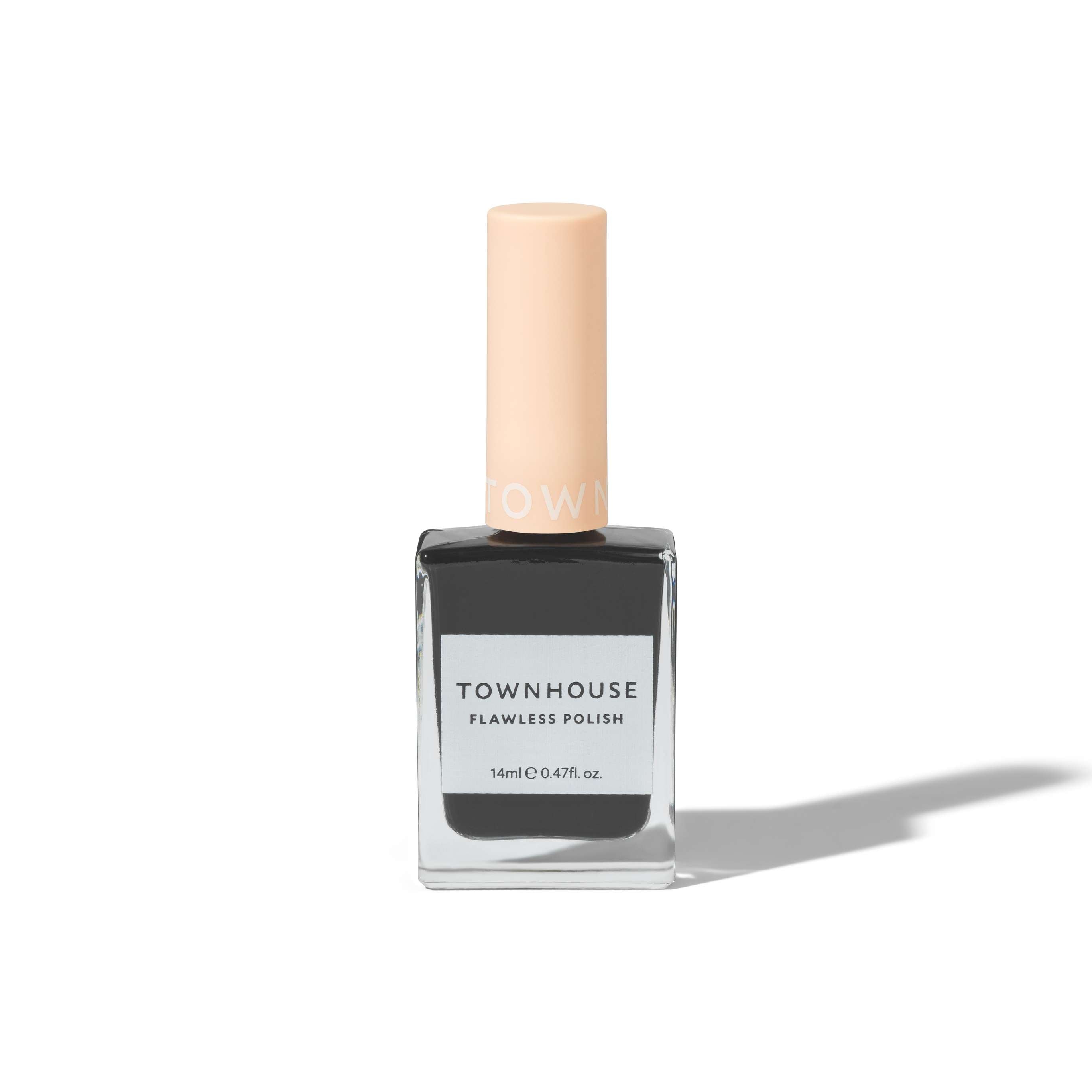A bottle of TH - Liquorice Polish 14ml, featuring a square glass base, glossy black nail polish with a patent finish, and a matte peach-colored cap, displayed on a white background.