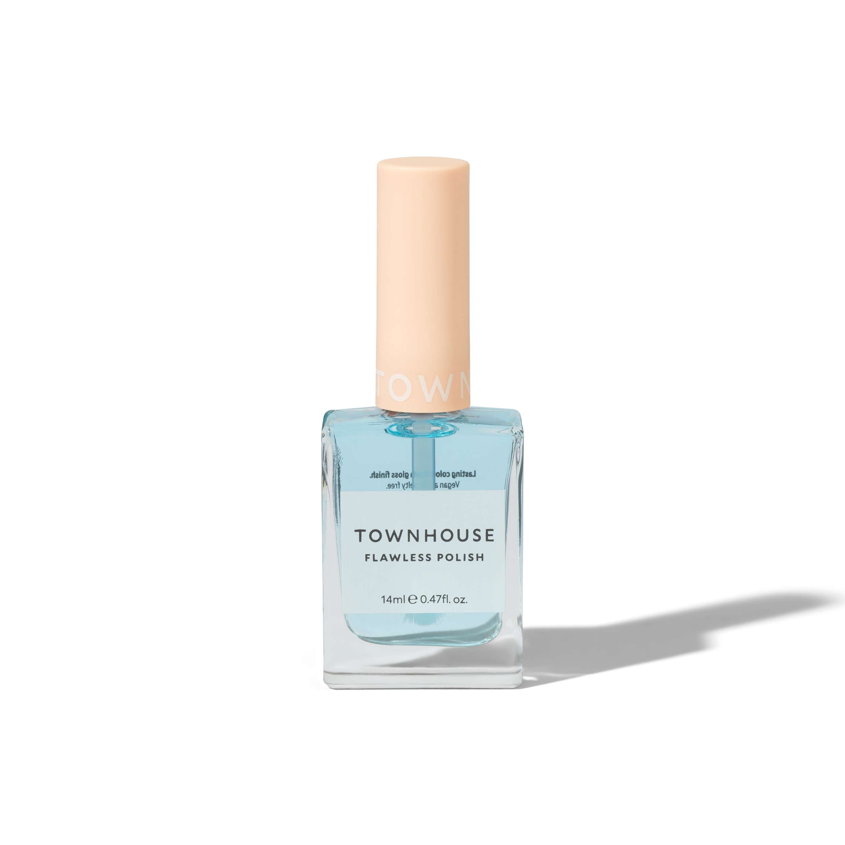 A bottle of TH - Base Coat Polish 14ml featuring a light blue shade, topped with a beige cap and adorned with a minimalist label, is displayed on a white background with a shadow to the right—making it an ideal addition to your base coat or top coat routine.