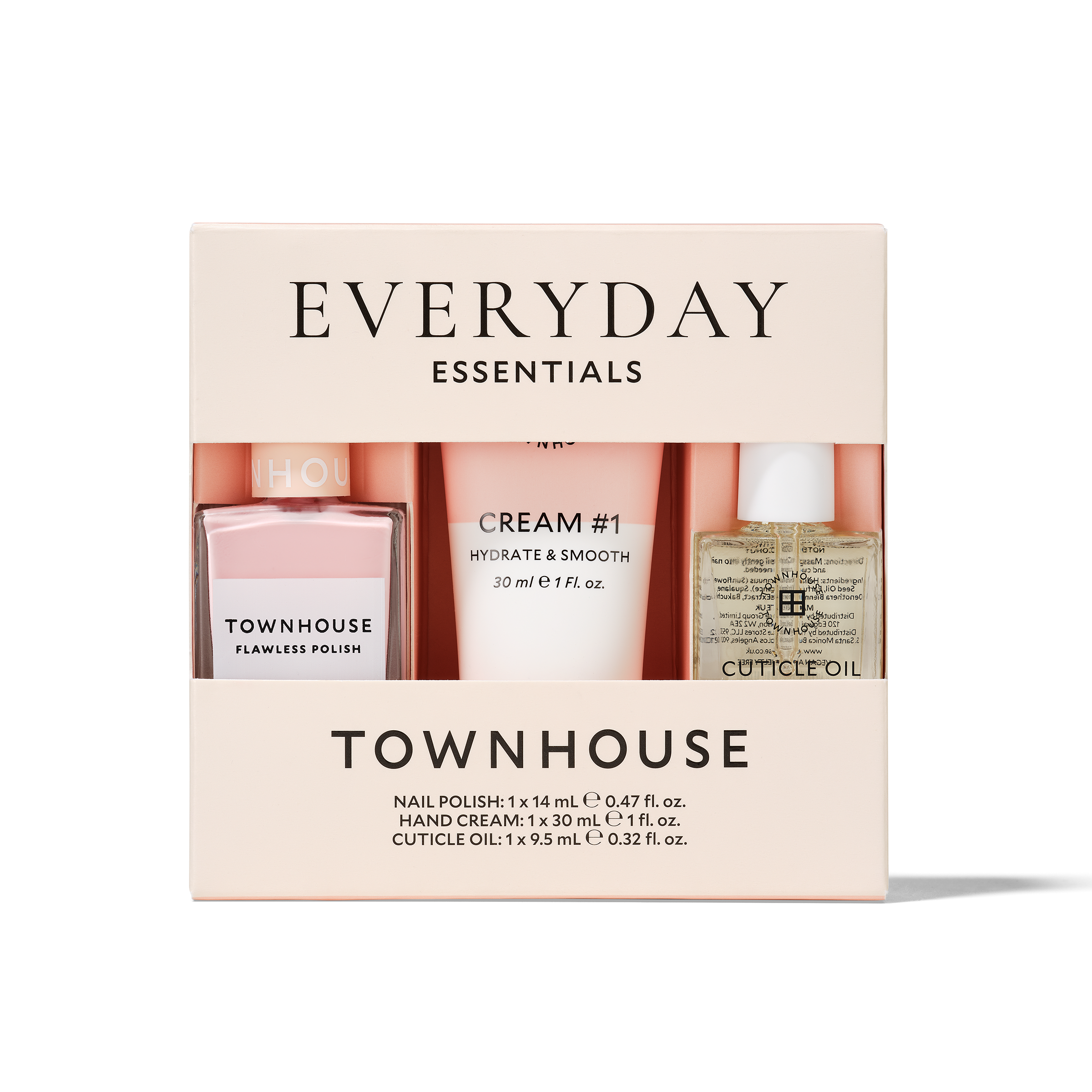 Everyday Essentials Kit featuring Flawless Polish in Strawberry Milk, nourishing hand cream, and cuticle oil in a light pink box, displayed against a white background.